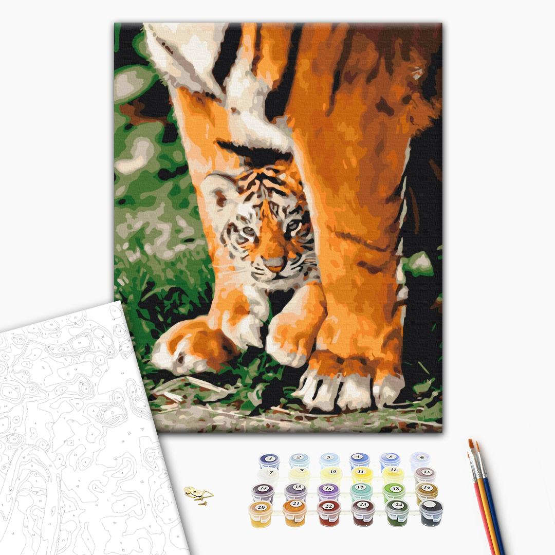 Junger Tiger in mächtigen Pfoten - Malen nach Zahlen Bild auf Leinwand mit Pinseln und Farben